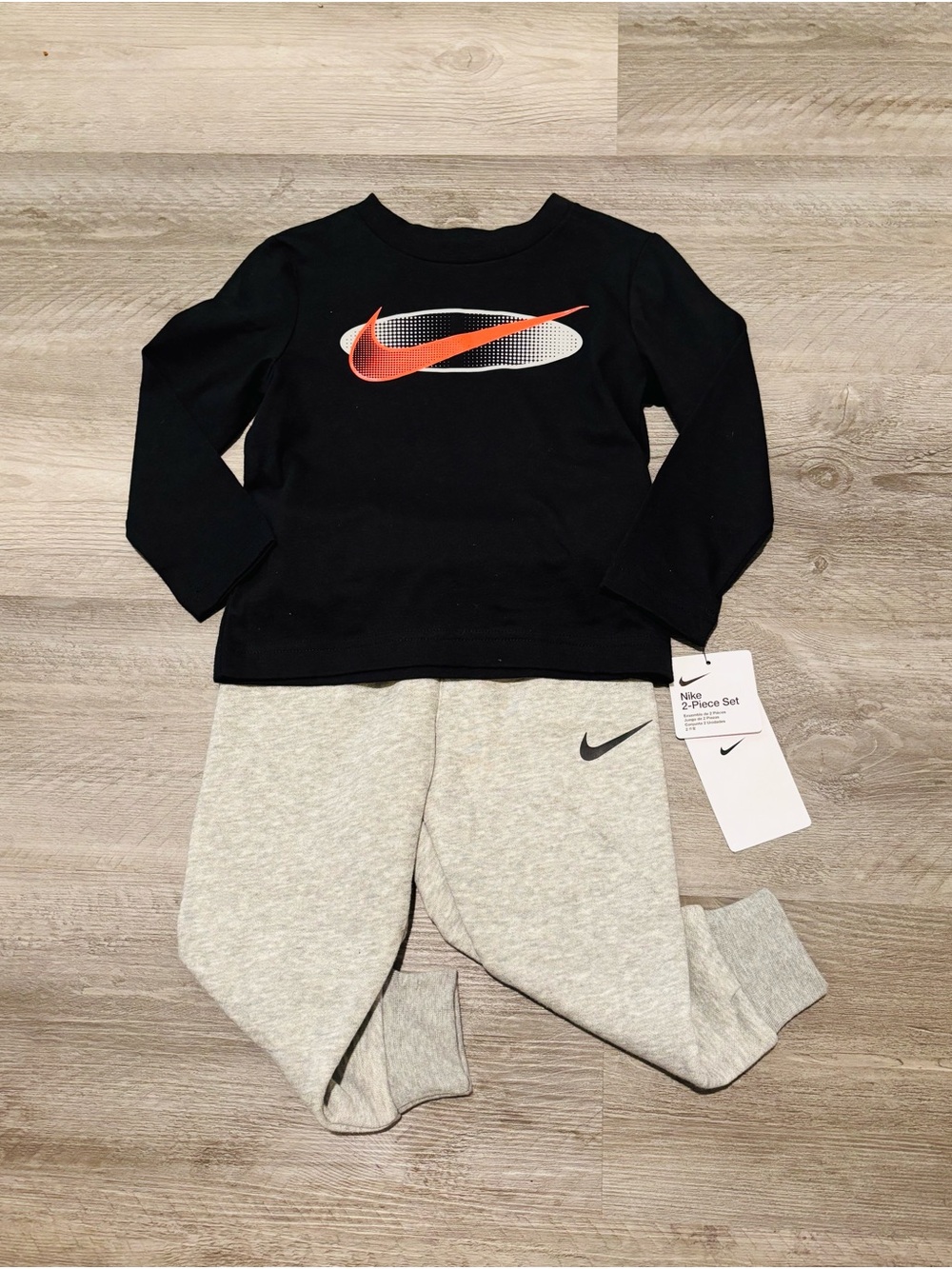 Nike Black Top with Orange Swoosh & Light Gray Joggers